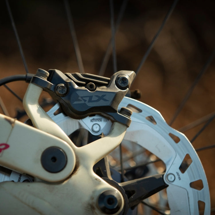 Pinza freno a disco SHIMANO SLX M7120 a 4 pistoncini