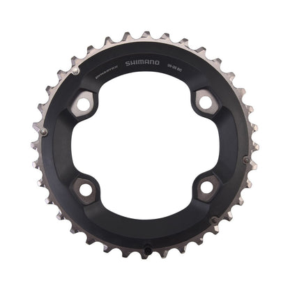 Corona esterna SHIMANO SLX M7000 11 velocità, doppia, 4 fori, 96 mm — vista della corona su sfondo bianco