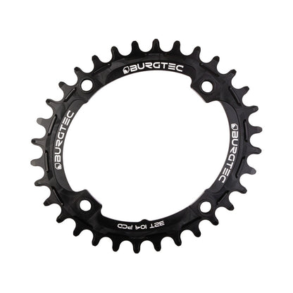 Corona monocorona BURGTEC THICK THIN ovale 10/11/12 velocità a denti stretti e larghi, 4 fori, 104 mm, nera — vista della corona su sfondo bianco