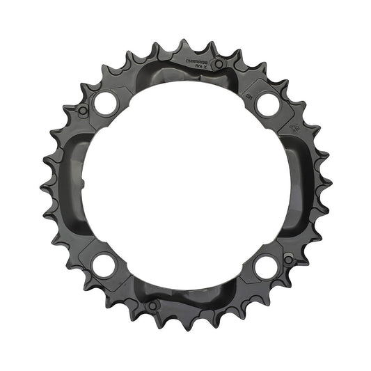 Corona intermedia SHIMANO DEORE M590 9 velocità, 4 fori, 104 mm, nera — vista della corona su sfondo bianco