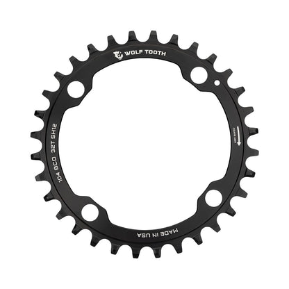 Corona monocorona WOLF TOOTH 104 BCD 12 velocità Shimano, 4 fori, 104 mm, nera — vista della corona su sfondo bianco