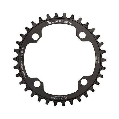 Corona intermedia WOLF TOOTH XTR M960 10/11/12 velocità, 4 fori, 102 mm — vista della corona su sfondo bianco