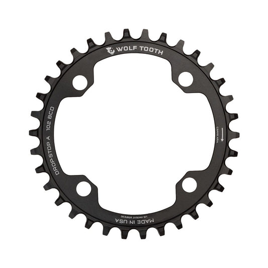 Corona intermedia WOLF TOOTH XTR M960 10/11/12 velocità, 4 fori, 102 mm — vista della corona su sfondo bianco