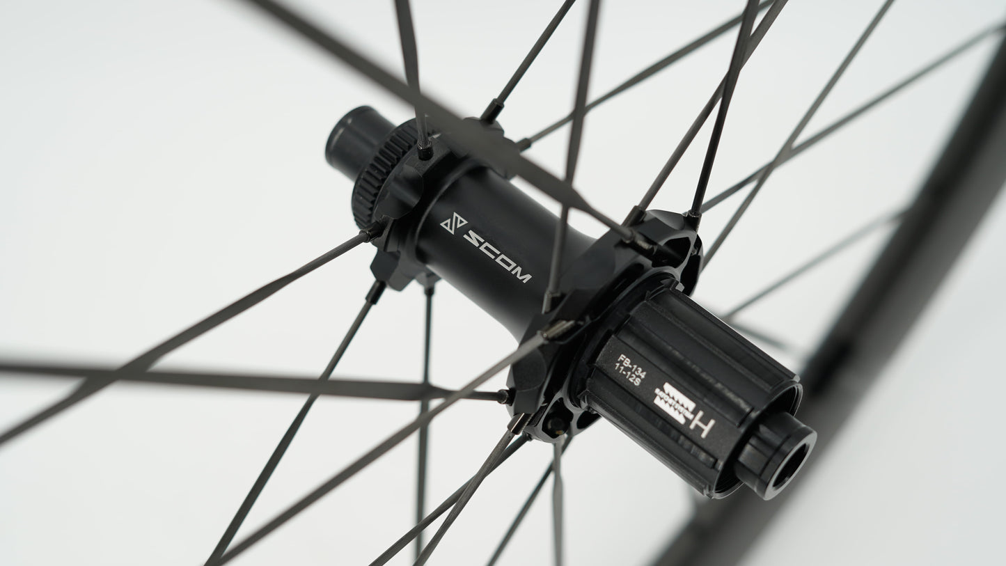 Coppia di ruote SCOM RACE Tubeless Ready (bloccaggio centrale)