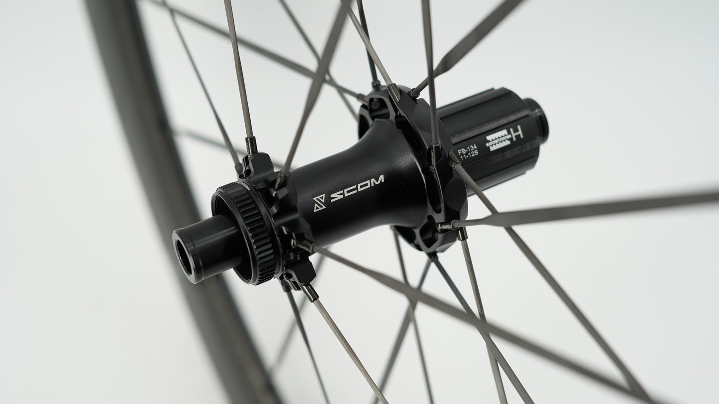Coppia di ruote SCOM RACE Tubeless Ready (bloccaggio centrale)
