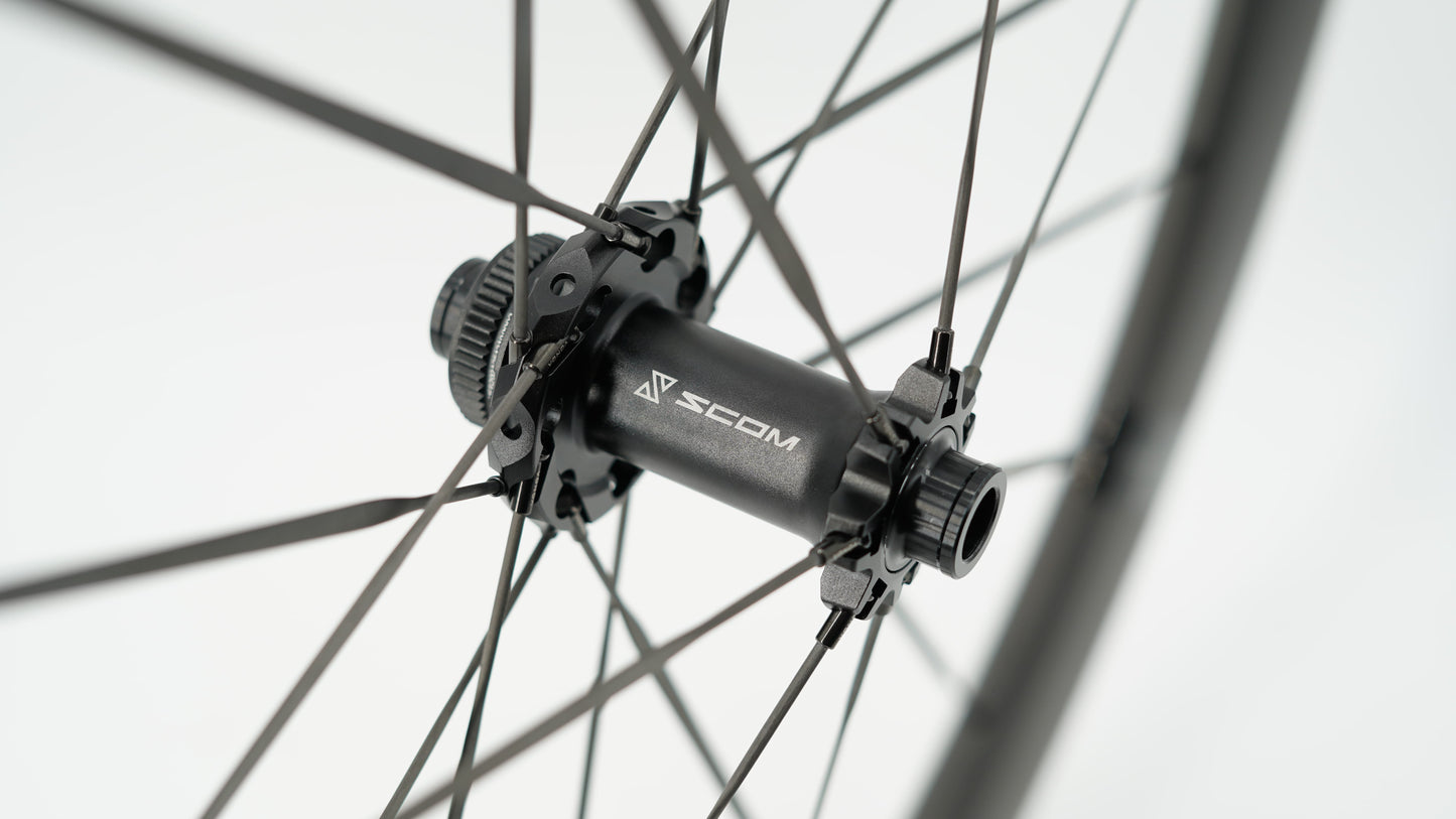 Coppia di ruote SCOM RACE Tubeless Ready (bloccaggio centrale)