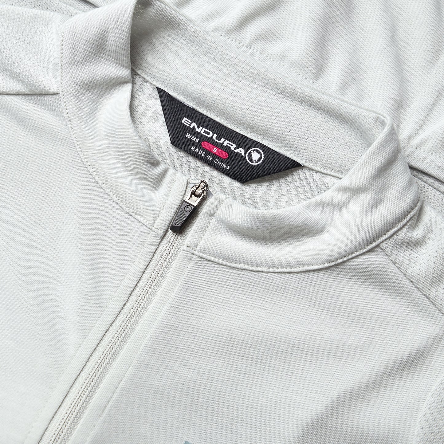 Maglia donna ENDURA LOOP ZIPPED a manica corta Grigio