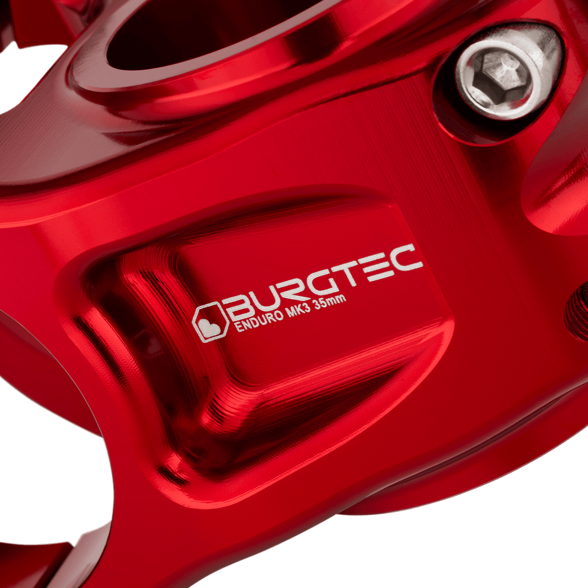 Attacco manubrio BURGTEC ENDURO MK3 rosso — dettaglio del corpo lavorato