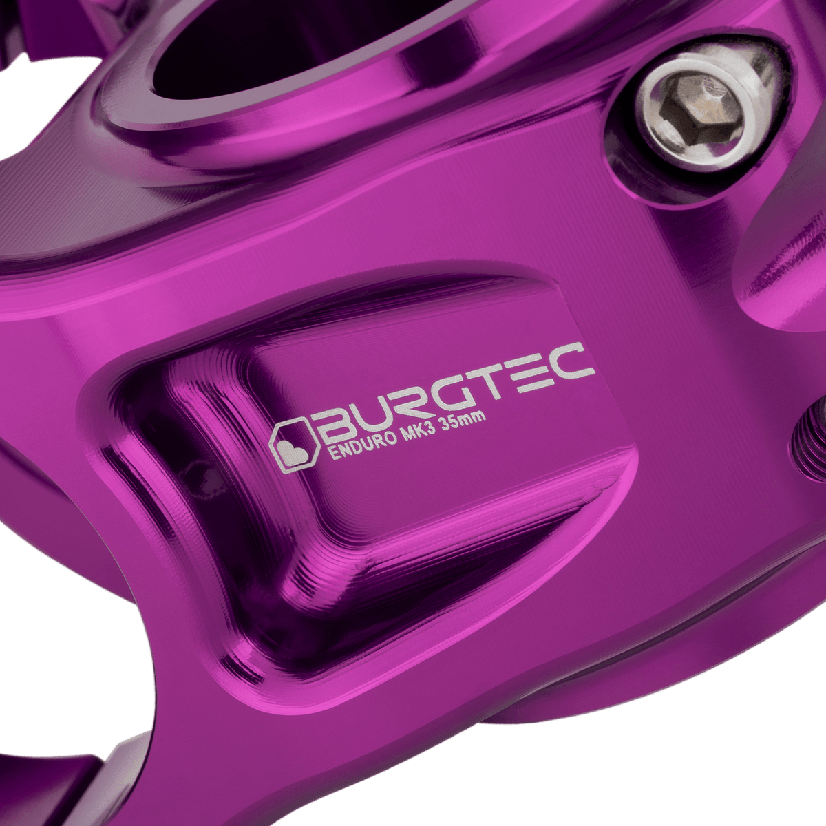 Attacco manubrio BURGTEC ENDURO MK3 viola — dettaglio del corpo lavorato