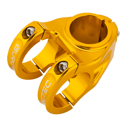 Attacco manubrio BURGTEC ENDURO MK3 oro — vista dall’alto a tre quarti
