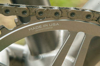 Piatto Mono WOLF TOOTH DROP-STOP B DM 8 Viti Sram Eagle Boost Offset 0mm Raw Silver
