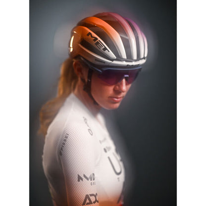 Casco Strada MET TRENTA 3K CARBON MIPS UAE TEAM ADQ 2026 Viola/Arancione
