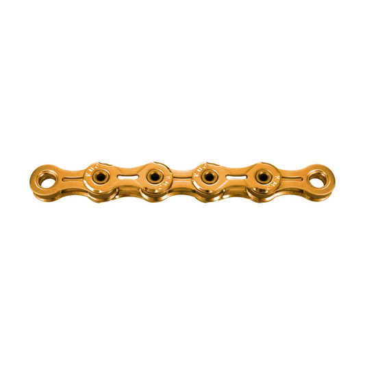 Catena KMC X11SL Ti-N a 11 velocità cerata color oro — foto del prodotto su sfondo bianco