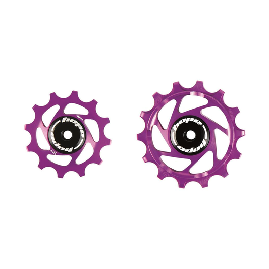 Pulegge del cambio posteriore a 12 velocità HOPE Sram da 12/14 denti viola — componente su sfondo bianco