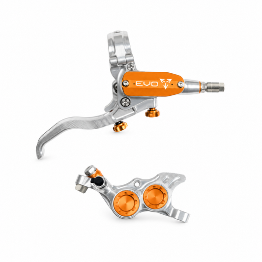 Freno HOPE TECH 4 EVO TR4 argento/arancione — leva e pinza su sfondo bianco