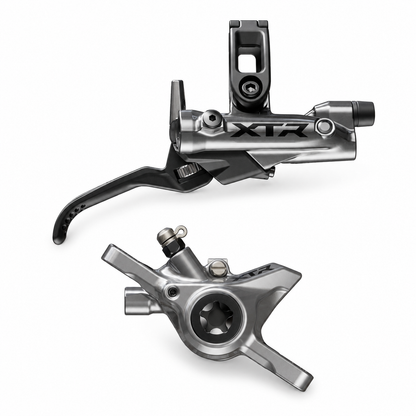 Freno SHIMANO XTR M9220/9200 XC/Trail a 2 pistoni — leva e pinza su sfondo bianco